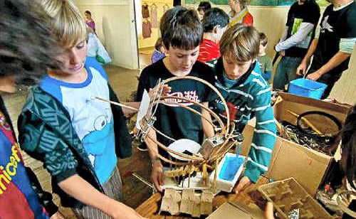 Kids get creative and make sculptures in the eco-craft pavilion at the energy festival. Kids get creative and make sculptures in the eco-craft pavilion at the energy festival.